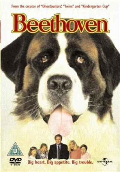 DVD cover for the movie Beethoven, featuring a large Saint Bernard dog face with its tongue out, the title 'Beethoven' in large red letters at the top, and small character silhouettes along the bottom.