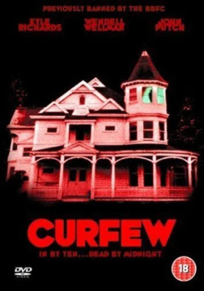 Horror movie poster for 'Curfew' with a red-lit house and text.