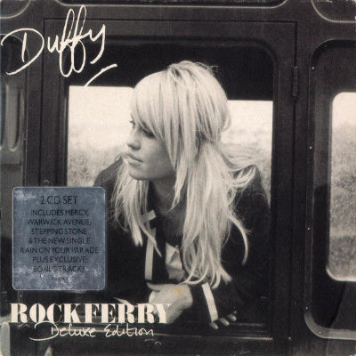Album cover with a woman's face and text about a 2CD set by Duffy.