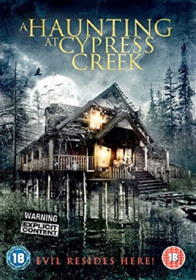 DVD cover of 'A Haunting at Cypress Creek' with a cabin by a lake and moonlit sky.