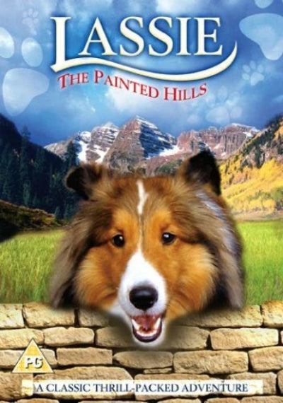 Movie poster for 'Lassie: The Painted Hills' with a dog's face on a stone wall and mountains in the background.