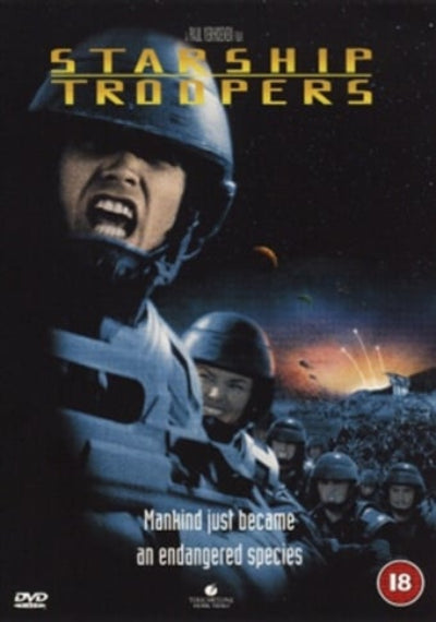 Starship Troopers DVD cover featuring soldiers in helmets against a space background with a planet and explosions. The title 'STARSHIP TROOPERS' appears in large gold letters at the top, with tagline text near the bottom and a red 18 age rating badge in the lower right corner.