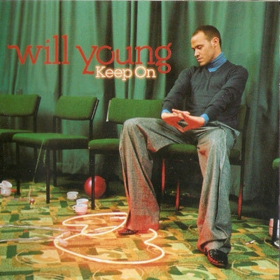 Album cover with a person sitting on a chair, text 'will young Keep On', and a green curtain background.