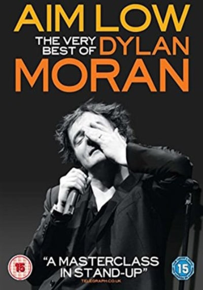 DVD cover of 'Aim Low: The Very Best of Dylan Moran' with a black and white photo of a man holding a microphone.