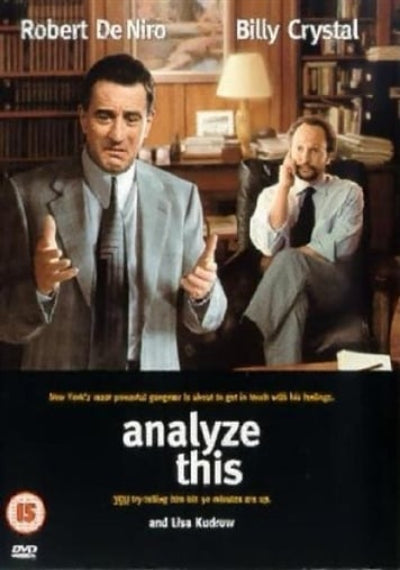 Movie poster for 'Analyze This' featuring Robert De Niro and Billy Crystal in a room with books and a lamp.