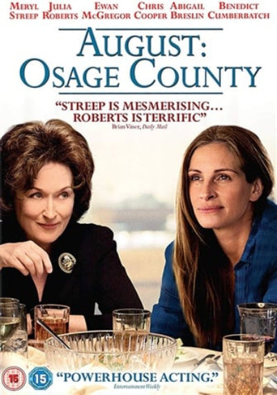 Movie poster for 'August: Osage County' featuring two women sitting at a table.