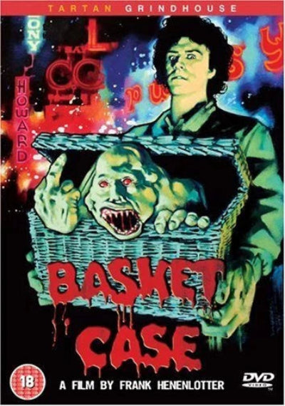 Movie poster for 'Basket Case' with a creature in a basket and text on a colorful background.