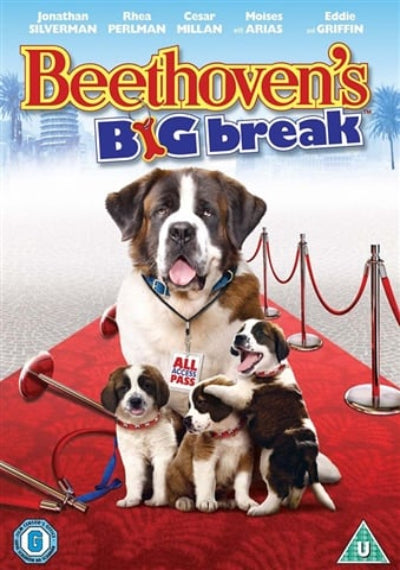 Poster for 'Beethoven's Big Break' with a dog and puppies on a red carpet.