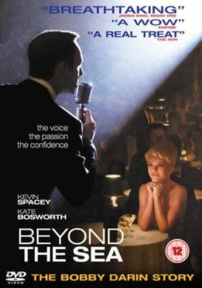 Movie poster for 'Beyond the Sea' featuring a man with a microphone and a woman sitting at a table.