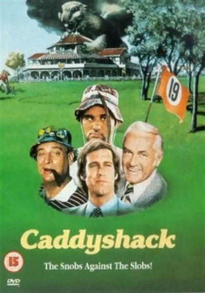 DVD cover of 'Caddyshack' with four men on a golf course and a building in the background.