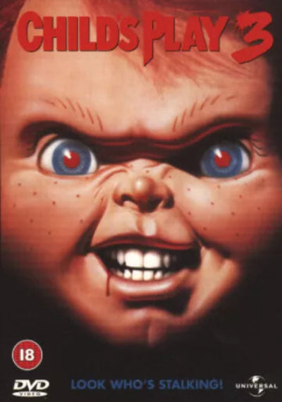 Poster of 'Child's Play 3' with a close-up of Chucky's face.
