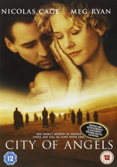 Movie poster for 'City of Angels' featuring Nicolas Cage and Meg Ryan with a desert scene in the background.