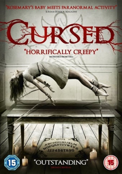 Movie poster for 'Cursed' with a woman tied to a table and text about horror.