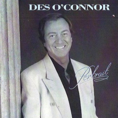 Album cover with a smiling man in a white suit, text 'Des O'Connor Portrait', and signature.