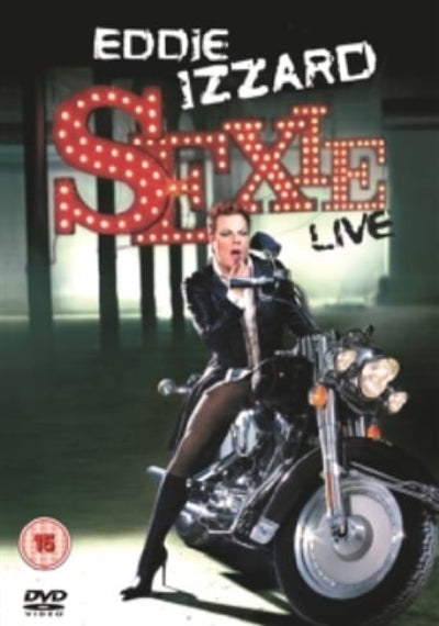 DVD cover for 'Eddie Izzard Sexle Live' featuring Eddie Izzard in a black leather jacket and thigh-high stockings seated on a motorcycle, with the title in large marquee-style letters and a DVD logo in the bottom left.