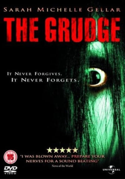 Movie poster for 'The Grudge' featuring a green eye and text.