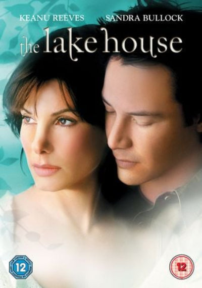 Movie poster for 'The Lake House' featuring Keanu Reeves and Sandra Bullock.
