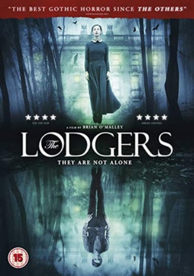 Movie poster for 'The Lodgers' with a woman in a dark coat walking through a forest.