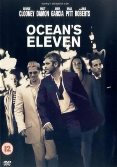 Movie poster for 'Ocean's Eleven' featuring four men in suits against a dark background.
