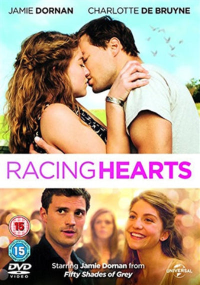 DVD cover for the movie 'Racing Hearts' starring Jamie Dornan and Charlotte De Bruyne, featuring a large romantic couple shot at the top, the title in bold pink text, smaller character portraits, age rating badges, and a Universal logo.