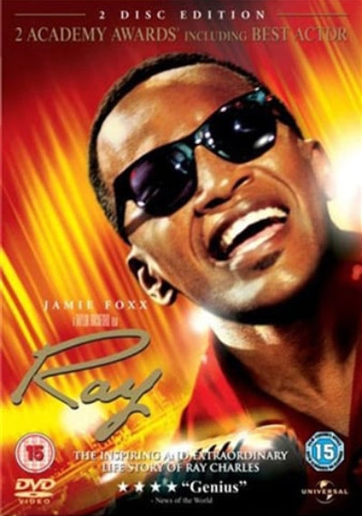 DVD cover of 'Ray' featuring Jamie Foxx with sunglasses and a bright background