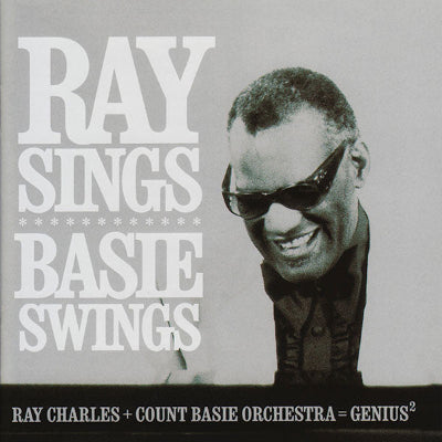 Album cover with text 'Ray Sings Basie Swings' featuring a portrait of a man wearing sunglasses.
