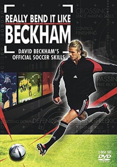 DVD cover for 'Really Bend It Like Beckham' featuring David Beckham in a black soccer uniform with red accents, set against a green field background with text overlays and skill-themed graphics.