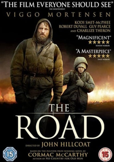 Movie poster for 'The Road' featuring Viggo Mortensen and Kodi Smit-McPhee in winter clothing against a dark, fiery landscape. Large white title text reads 'THE ROAD' with critical quotes above and age rating badges at the bottom.