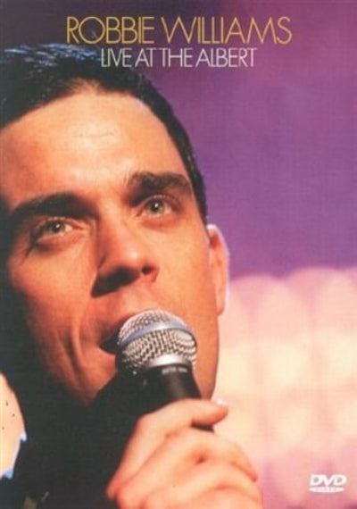Robbie Williams 'Live at the Albert' DVD cover featuring a close-up photo of the singer holding a microphone against a purple stage background, with gold and white title text at the top and a small DVD logo in the bottom right corner.