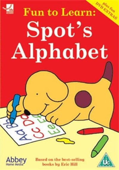 Front cover of the children's book 'Fun to Learn: Spot's Alphabet' featuring a bright red background, large white title text, a cartoon yellow puppy with a purple spot, and colorful crayons on a yellow surface. Abbey Home Media branding is visible.