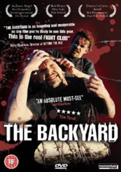 DVD cover of 'The Backyard' with two people in a dramatic pose against a red background.