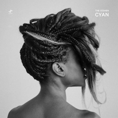 Black and white image of a person with braided hair, featuring the brand 'The Seshen Cyan'.