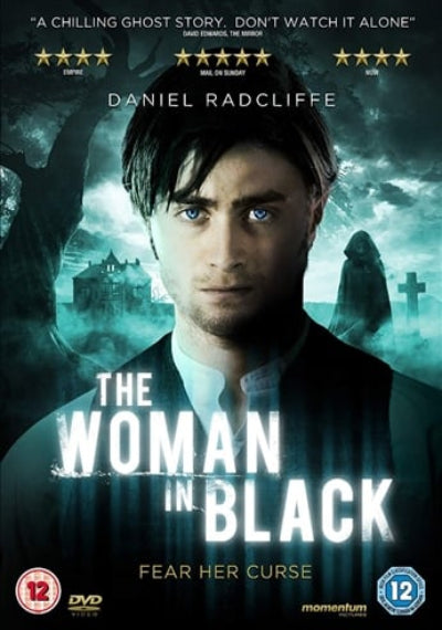 Movie poster for 'The Woman in Black' featuring Daniel Radcliffe with a ghostly figure in the background.