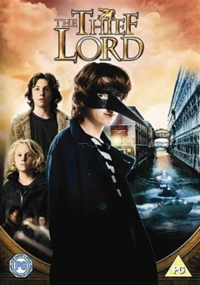 Movie poster for 'The Thief Lord' featuring three characters and a cityscape.