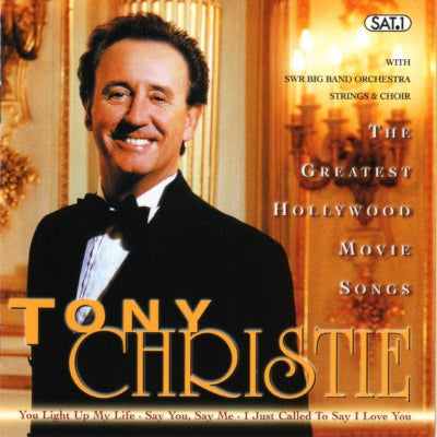 Album cover featuring Tony Christie with text about greatest Hollywood movie songs and orchestra.