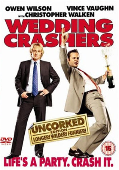 two men partying with a bottle of champagne in hand