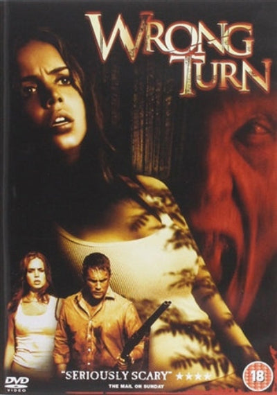 Movie poster for 'Wrong Turn' featuring a woman, a man, and a horse with a scary expression.